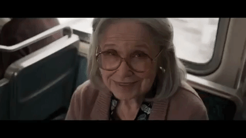 Captain-Marvel-Punches-Skrull-Old-Lady.gif